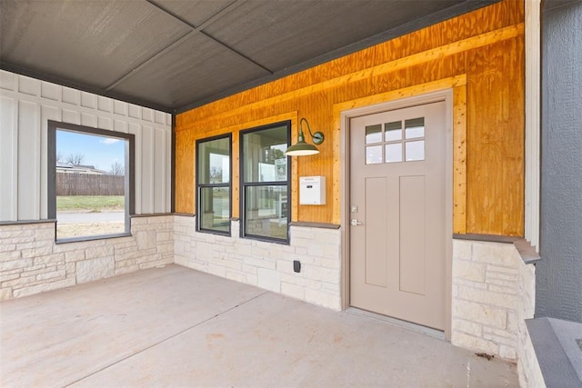 property entrance featuring covered porch