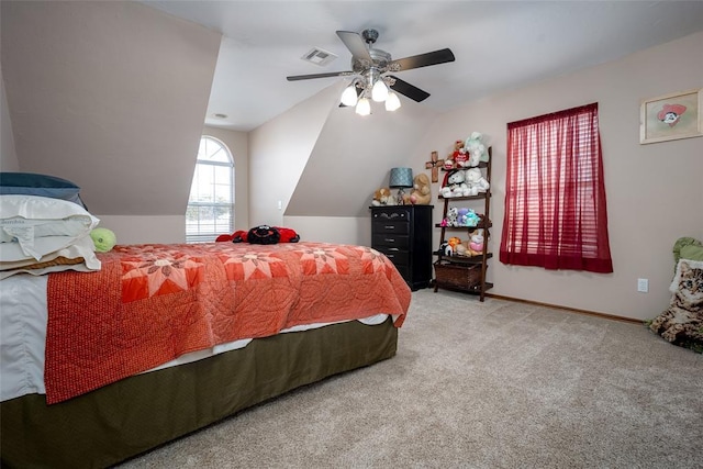 carpeted bedroom featuring ceiling fan and lofted ceiling