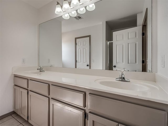 bathroom featuring tile patterned floors and vanity