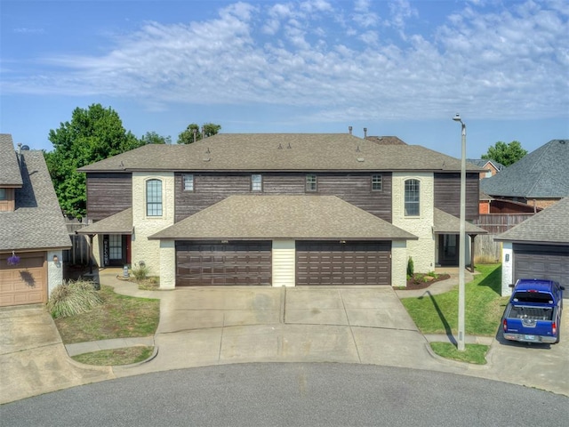 front of property with a garage