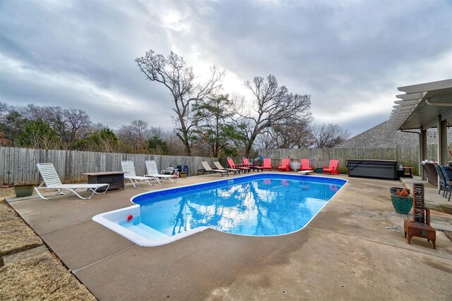 301 Club House Dr, Shawnee, OK 74801 - view of swimming pool with a hot tub, a patio, and a fenced backyard
