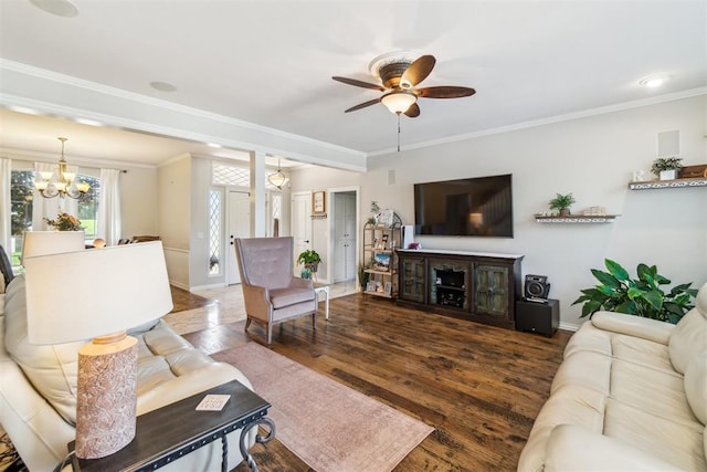 301 Club House Dr, Shawnee, OK 74801 - living area with a chandelier, ceiling fan, baseboards, wood finished floors, and ornamental molding