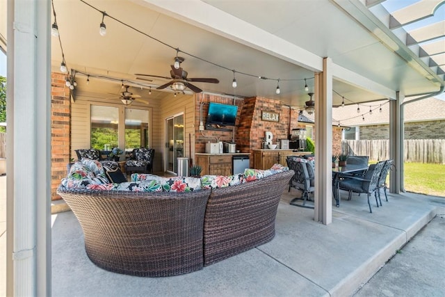 301 Club House Dr, Shawnee, OK 74801 - view of patio / terrace featuring an outdoor kitchen, an outdoor hangout area, ceiling fan, fence, and outdoor dining space