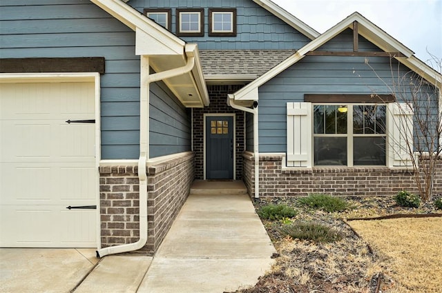 property entrance with a garage