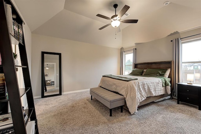 bedroom with carpet flooring, ceiling fan, and vaulted ceiling