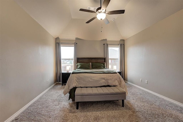 bedroom with carpet flooring, ceiling fan, and vaulted ceiling