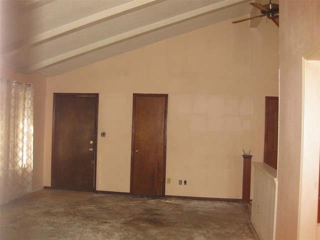 unfurnished room with lofted ceiling with beams and ceiling fan