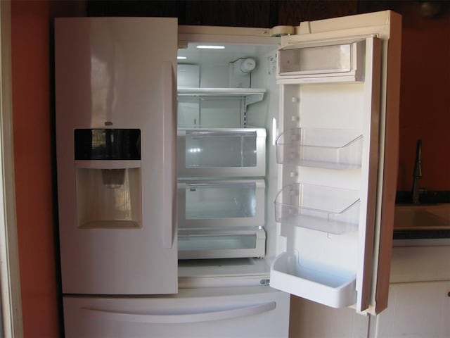 room details featuring white fridge