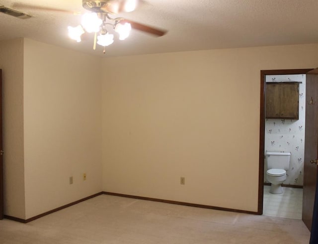 empty room featuring ceiling fan