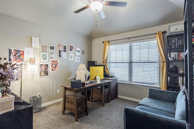 carpeted office with ceiling fan and lofted ceiling