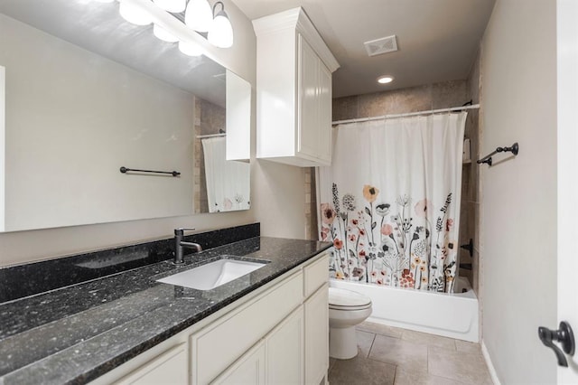 full bathroom featuring toilet, vanity, shower / tub combo with curtain, and tile patterned flooring