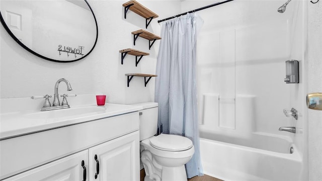 full bathroom with shower / bath combo with shower curtain, vanity, and toilet