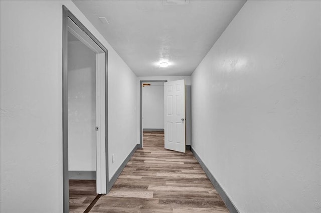 hall featuring light hardwood / wood-style flooring