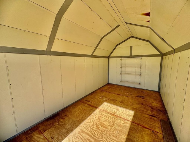 interior space featuring vaulted ceiling and hardwood / wood-style floors