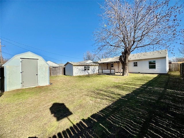 view of yard with a storage unit