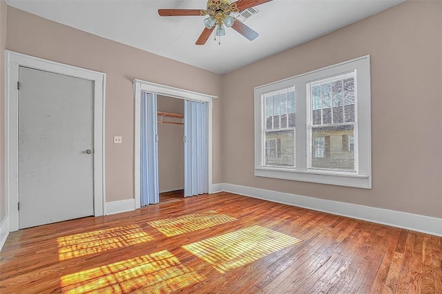 unfurnished bedroom featuring ceiling fan and light hardwood / wood-style floors