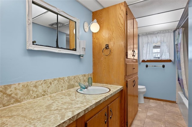 full bathroom with shower / bath combination with curtain, vanity, and toilet