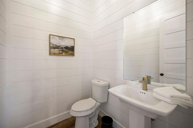 bathroom featuring sink and toilet