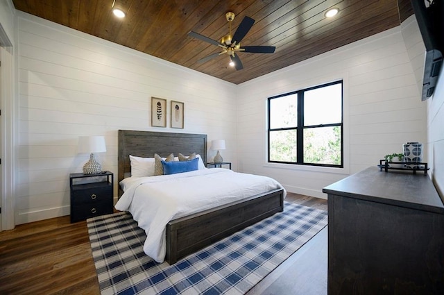 bedroom featuring ceiling fan, wood ceiling, and dark wood-type flooring