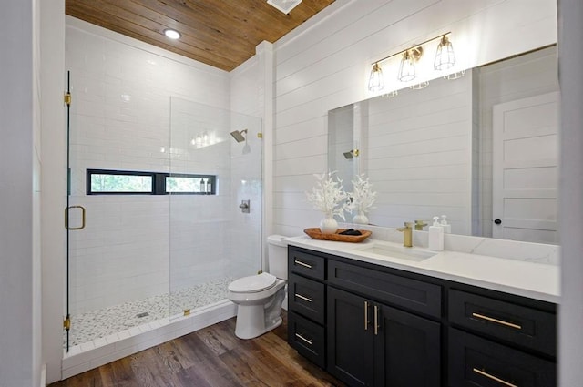 bathroom featuring hardwood / wood-style floors, an enclosed shower, toilet, vanity, and wood ceiling