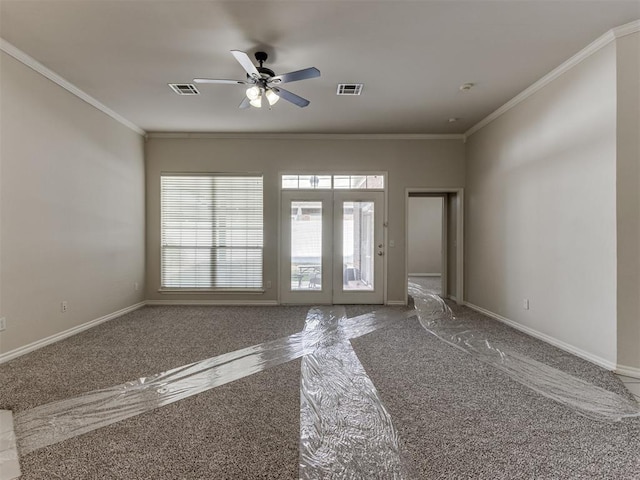 unfurnished room featuring french doors, ceiling fan, and ornamental molding