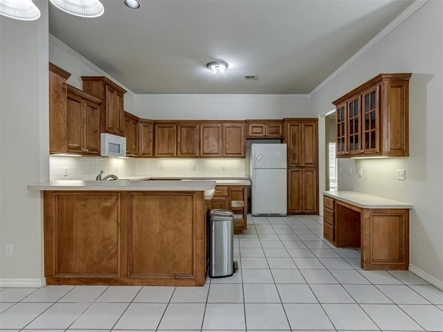 kitchen featuring crown molding, white appliances, kitchen peninsula, and light tile patterned floors