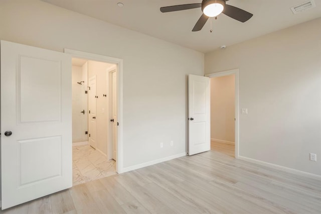 unfurnished bedroom with ceiling fan and light hardwood / wood-style floors