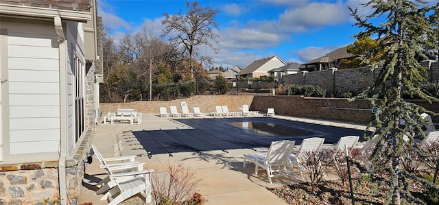 view of pool featuring a patio area