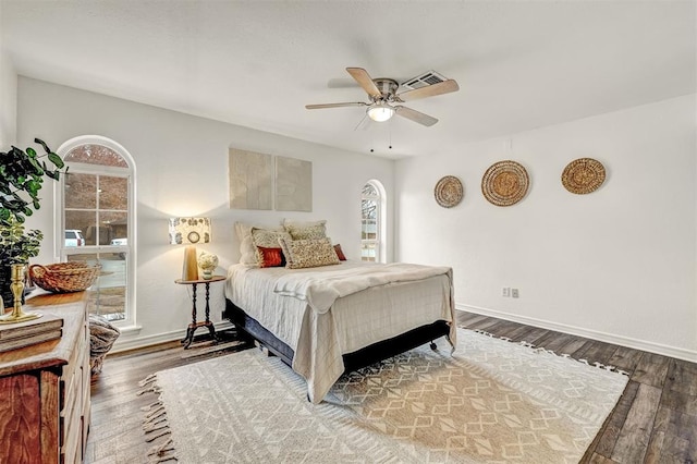 bedroom featuring ceiling fan and wood-type flooring