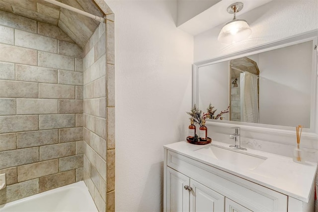 bathroom with vanity and shower / bath combo with shower curtain