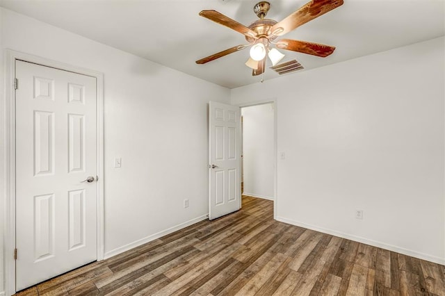 interior space featuring ceiling fan and hardwood / wood-style flooring