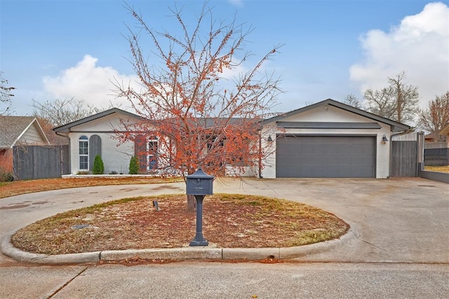 single story home featuring a garage