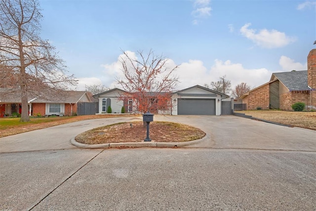 ranch-style home featuring a garage