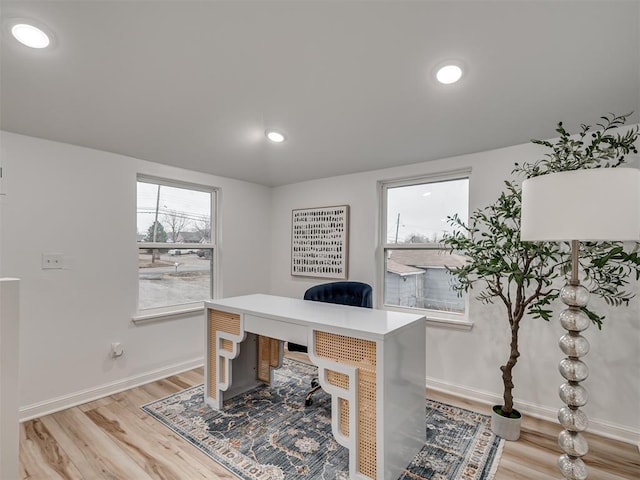 office area with recessed lighting, light wood-style flooring, and baseboards