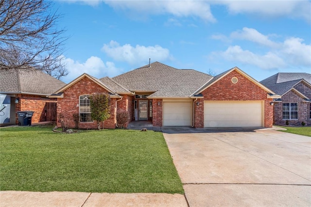 view of front facade featuring a front lawn and a garage