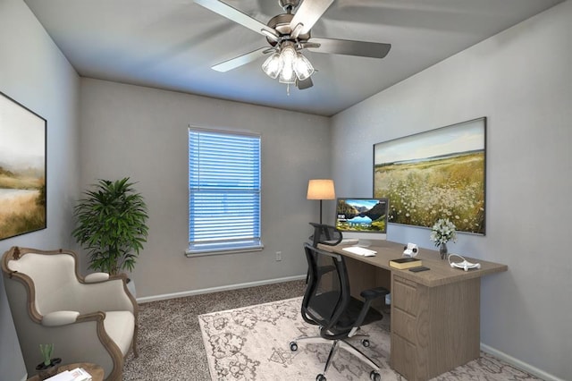 office area with carpet and ceiling fan