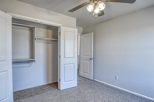 unfurnished bedroom featuring light colored carpet, a closet, and ceiling fan