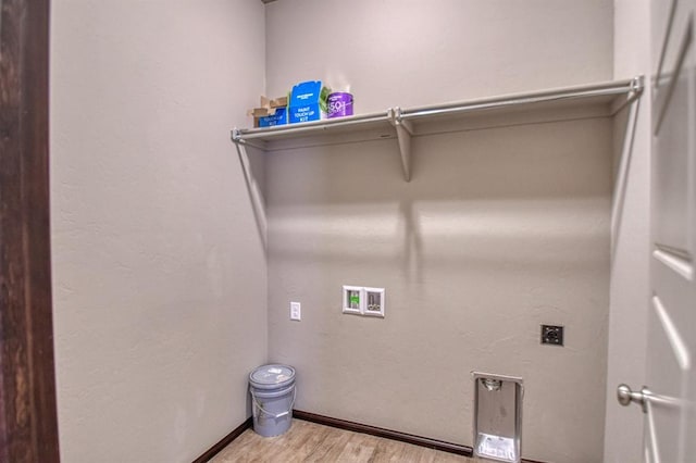 laundry room with washer hookup, light wood-style flooring, electric dryer hookup, laundry area, and baseboards