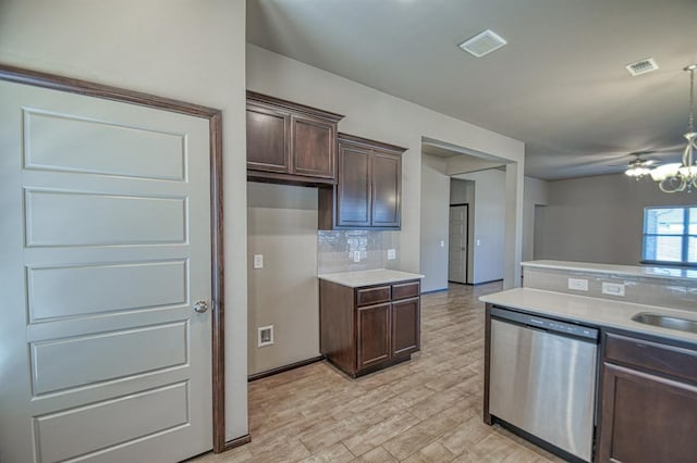 kitchen with decorative backsplash, light countertops, dark brown cabinets, and stainless steel dishwasher