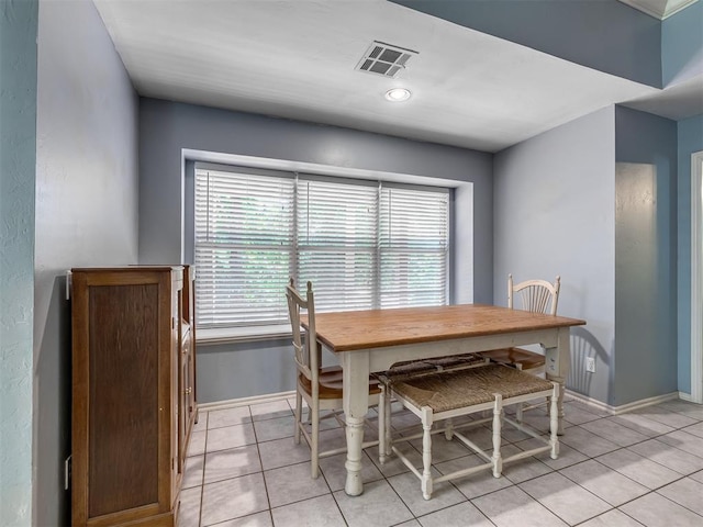 dining room featuring light tile patterned floors