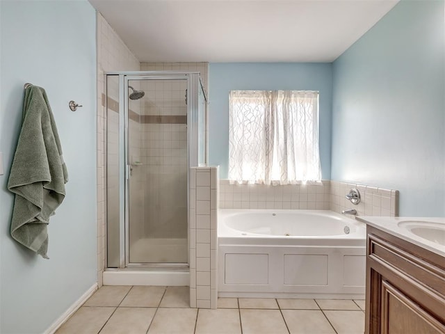 bathroom featuring vanity, separate shower and tub, and tile patterned floors