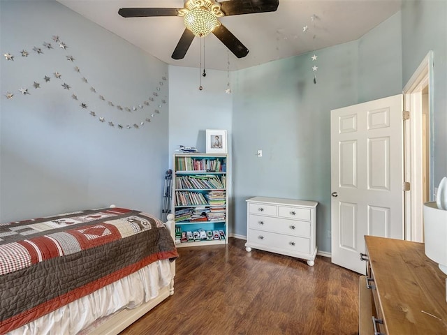 bedroom featuring dark hardwood / wood-style floors and ceiling fan