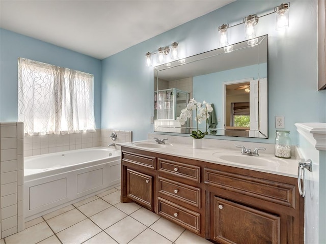 1801 Del Simmons Dr, Edmond, OK 73003 - bathroom featuring a garden tub, tile patterned floors, double vanity, and a shower stall