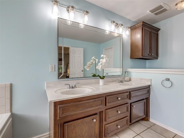 1801 Del Simmons Dr, Edmond, OK 73003 - full bathroom featuring double vanity, tile patterned flooring, and a tub