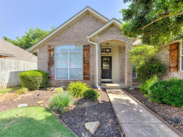 1801 Del Simmons Dr, Edmond, OK 73003 - view of front of house featuring brick siding