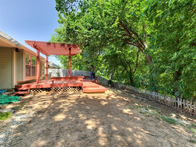 1801 Del Simmons Dr, Edmond, OK 73003 - fenced backyard with a wooden deck and a pergola