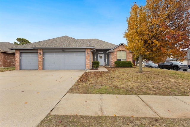 single story home with a garage