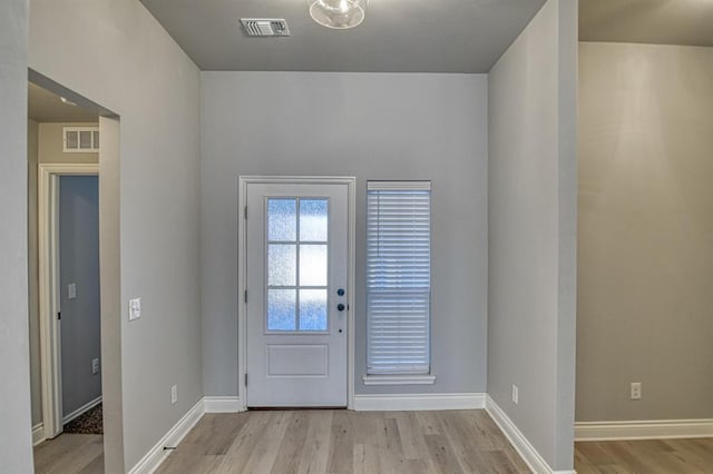 doorway to outside featuring light hardwood / wood-style flooring