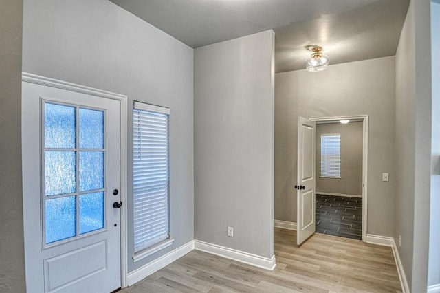 foyer entrance featuring light wood-type flooring