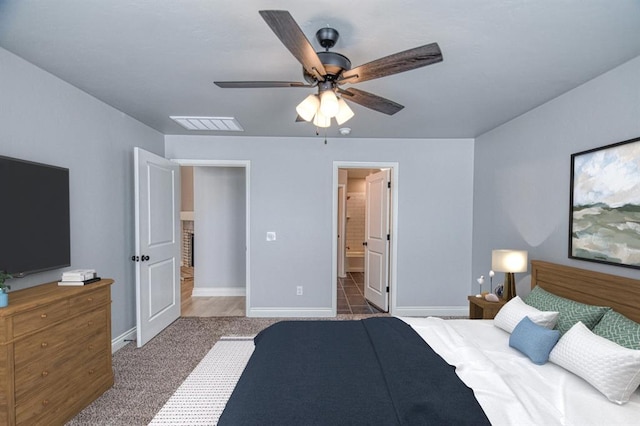 bedroom featuring carpet flooring, connected bathroom, and ceiling fan